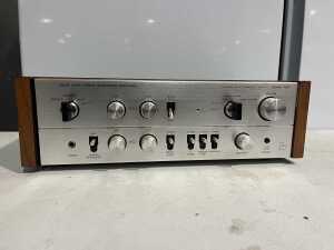 Luxman 700X solid state stereo integrated amplifier, timber cheeks, c1970