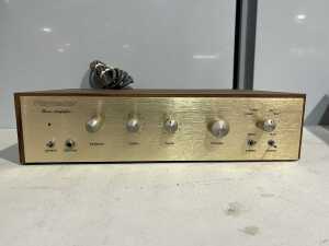 Playmaster stereo amplifier, Australian kit-built, woodgrain case, c1970s