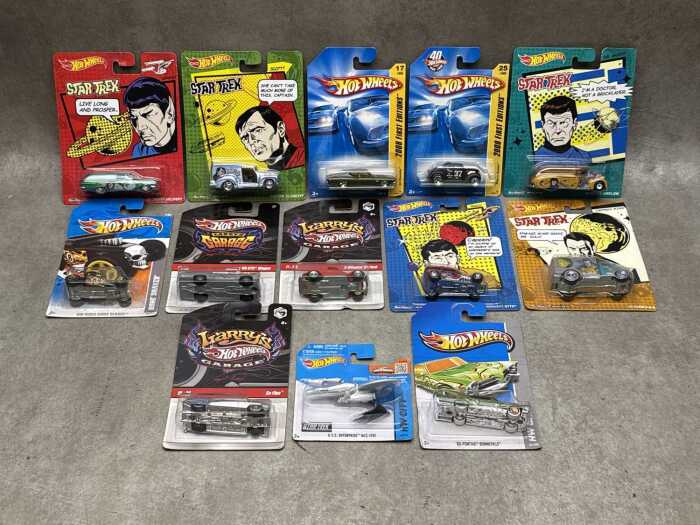 Hot Wheels die-cast collectible cars, including Star Trak