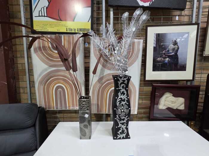 Two decorative floor vases with artificial arrangements