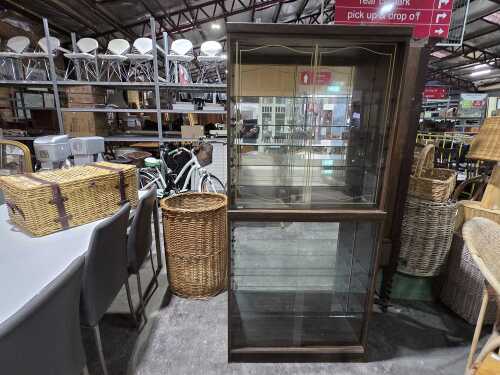 Mid-century display cabinet with glazed sliding doors