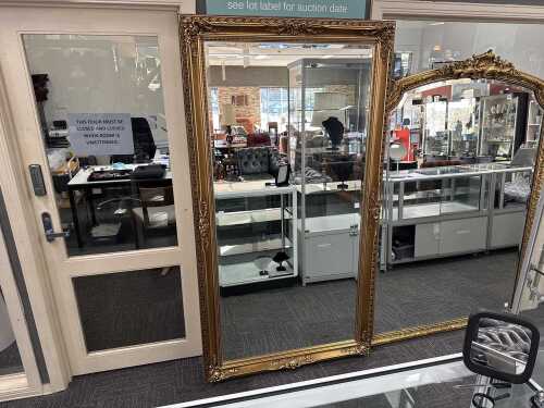 Ornate gilt framed wall mirror