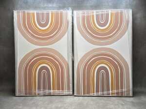 Pair of geometric prints on canvas in timber frames