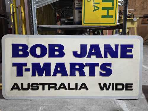 Bob Jane T-Mart timber and acrylic window promotional sign