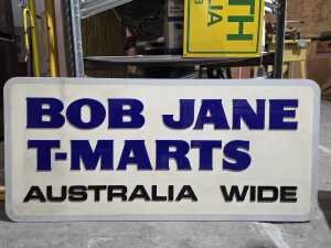 Bob Jane T-Mart timber and acrylic window promotional sign