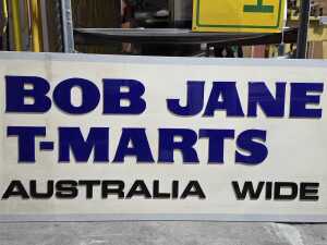 Bob Jane T-Mart timber and acrylic window promotional sign - 2
