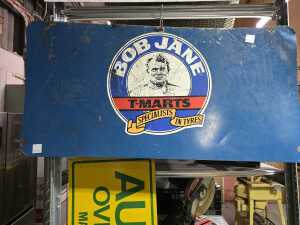 Three metal automotive advertising signs including a double-sided one. - 4