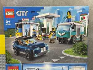 Three LEGO City playsets and a base plate - 2