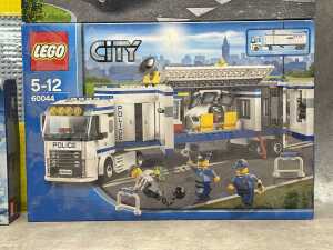 Three LEGO City playsets and a base plate - 3