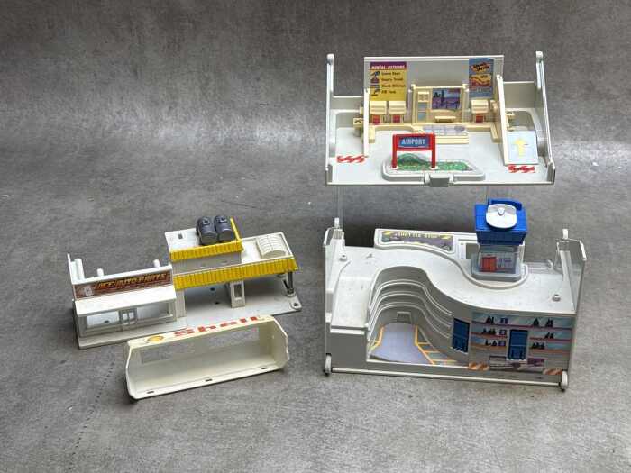 Collection of LEGO blocks and die-cast vehicles