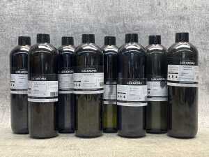 Eight bottles of Luxaroma fragrance concentrates