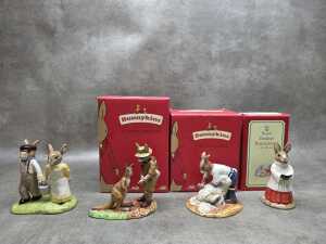 Four Royal Doulton 'Bunnykins' porcelain figures, most with boxes