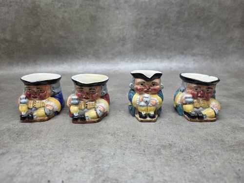 Four Clarice Cliff ceramic toby jugs
