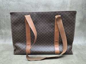 Brown and tan coated canvas shoulder tote bag