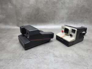 Two Polaroid instant cameras - 2