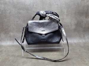 Black handbag with silver-tone hardware and a bag scarf