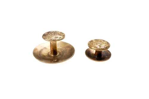 Two antique button cuffs in 15 carat yellow gold