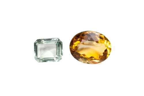 An emerald cut aquamarine and a oval citrine