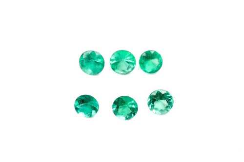 A collection of six round emeralds