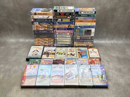 Group of VHS tapes, mainly nostalgia movie titles, including Marx Brothers