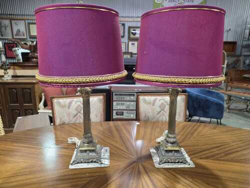 Pair of table lamps with decorative column stem and purple shades