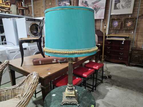 Table lamp with column stem and blue fabric shade