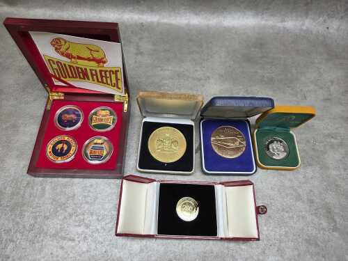 Group of collectable Australian medallions in cases