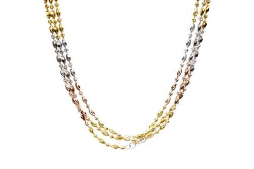 A triple strand three tone necklace in sterling silver