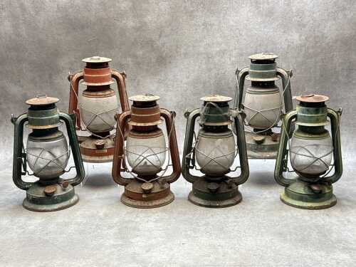 Six hurricane lanterns.