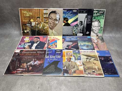 Fifteen Nat King Cole vinyl records, including Love is the Thing