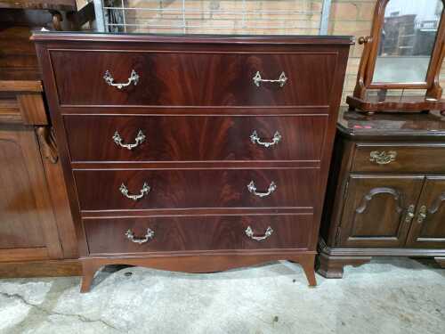 Mahogany chest of four drawers with glass top