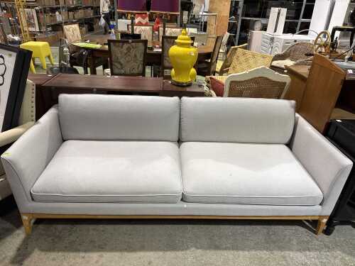 Contemporary grey upholstered three-seat sofa