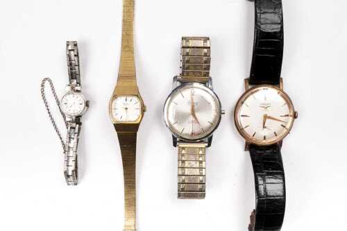 A collection of four watches