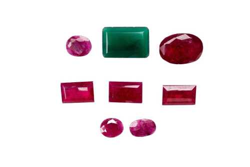 A collection of rubies and one emerald
