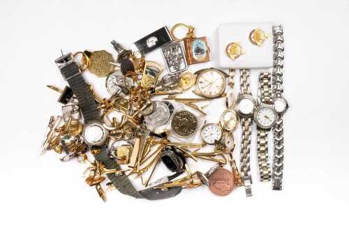 A collection of mens accessories and watches