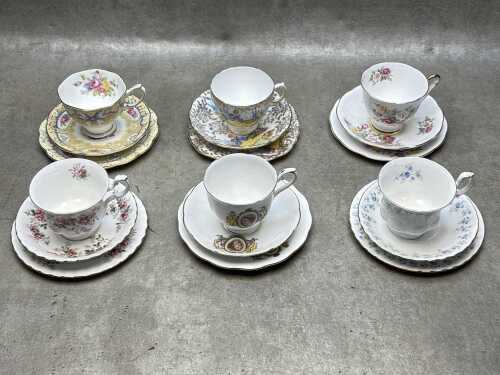 Six English porcelain trios, four Royal Albert