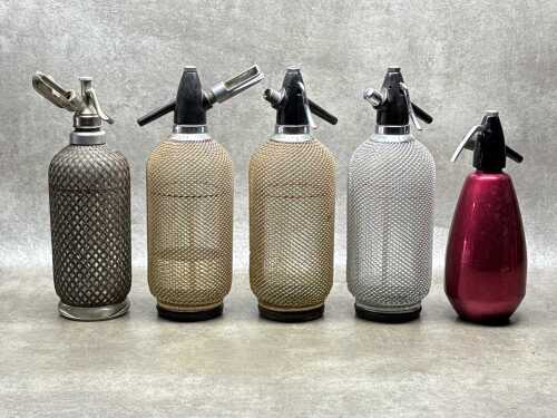 Five soda siphons