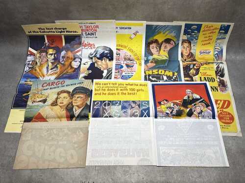 Eight movie posters, including The Sandpiper