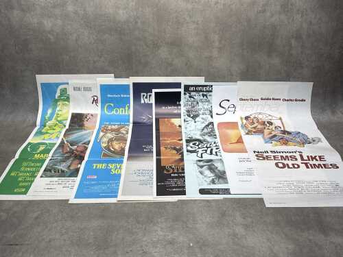 Eight movie posters, including The Seven Per Cent Solution