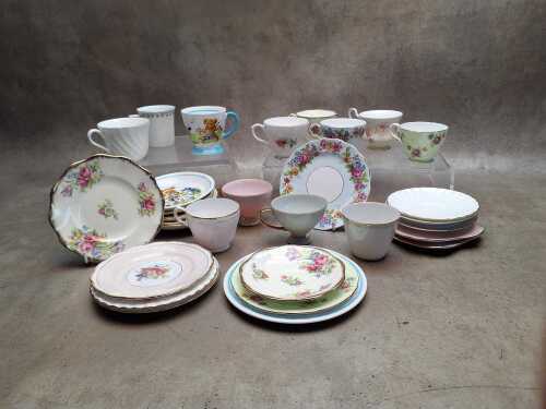 Seven porcelain trios, together with five duos