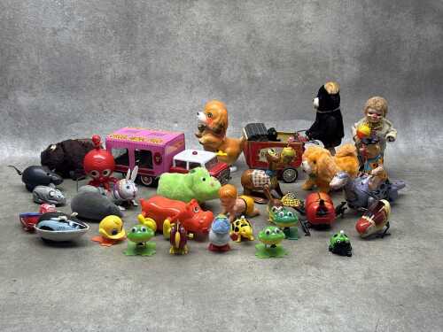 Wind-up toys including tin and plastic.