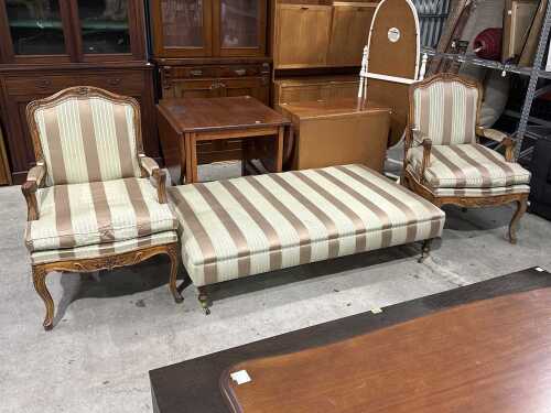 Pair of upholstered armchairs with matching ottoman