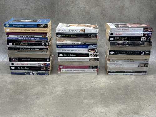 Collectable adult paperback novels, some sealed (adult content), including Strictly Pleasure