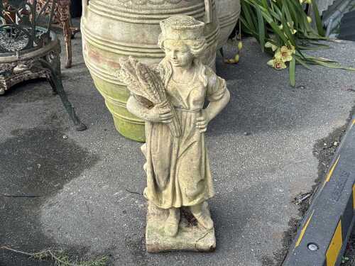 Garden statue of female figure