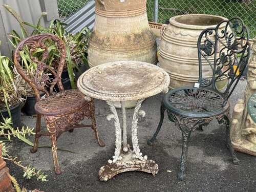 Three-piece cast metal garden setting