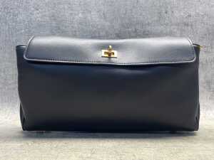 Designer-style black leather handbag with gold-tone hardware. - 2