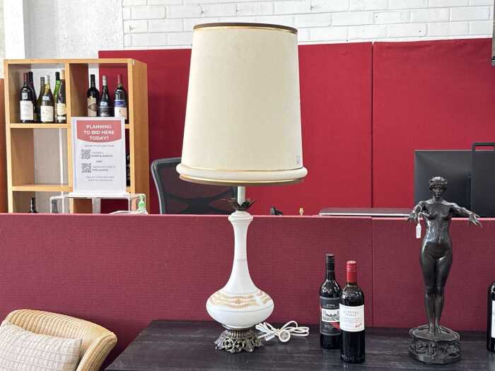 Milk glass lamp with gold-tone floral and leaf scroll accents.