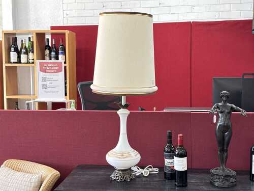 Milk glass lamp with gold-tone floral and leaf scroll accents.