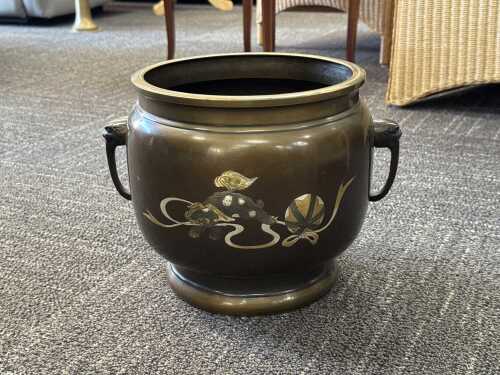 Chinese brass twin-handled planter with applied decoration of Foo dog and ball