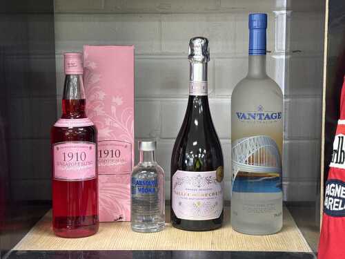 Four assorted bottles of alcohol